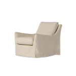 Featuring Monette Natural Slipcover Swivel Chair by Four Hands at Amethyst Home. This 360-degree swivel chair is defined by slightly sloping, flared arms and a floor-length slipcover. Finished in a soft, tight weave slipcover for a traditional style. Durable and soft to the touch, Libeco™-sourced linens are artisan-made and free of toxic chemicals. Slipcovered styles are fully remova. Amethyst Home provides interior design, new construction, custom furniture and area rugs in the Seattle metro area
