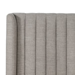 Featuring Montgomery Bed by Four Hands at Amethyst Home. The Montgomery Bed is a tall, vertical-channeled headboard that is upholstered in grey high-performance fabric for a sensible take on modern bedroom styling. A parawood plinth base grounds the whole look. Performance fabrics are specially created to withstand spills, stains, high traffic and wear, ensuring long-term comfort and unmatched . Amethyst Home provides interior design services, furniture, rugs, and lighting in the Omaha metro area.
