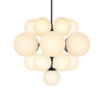 Featuring Nova Black Gunmetal Chandelier by Four Hands at Amethyst Home. Marbled glass spheres form an interstellar cluster around a matte black frame. Each globe is individually blown, shaped and sculpted by hand through a one-hour process. The finish on the pendant brass frame is achieved through a specialized process that turns the brass into an almost b. Amethyst Home provides interior design, new home construction design consulting, vintage area rugs, and lighting in the Calabasas metro area.