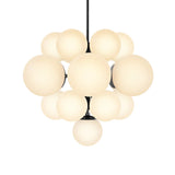 Featuring Nova Black Gunmetal Chandelier by Four Hands at Amethyst Home. Marbled glass spheres form an interstellar cluster around a matte black frame. Each globe is individually blown, shaped and sculpted by hand through a one-hour process. The finish on the pendant brass frame is achieved through a specialized process that turns the brass into an almost b. Amethyst Home provides interior design, new home construction design consulting, vintage area rugs, and lighting in the Calabasas metro area.