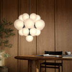 Featuring Nova Black Gunmetal Chandelier by Four Hands at Amethyst Home. Marbled glass spheres form an interstellar cluster around a matte black frame. Each globe is individually blown, shaped and sculpted by hand through a one-hour process. The finish on the pendant brass frame is achieved through a specialized process that turns the brass into an almost. Amethyst Home provides interior design, new home construction design consulting, vintage area rugs, and lighting in the Kansas City metro area.