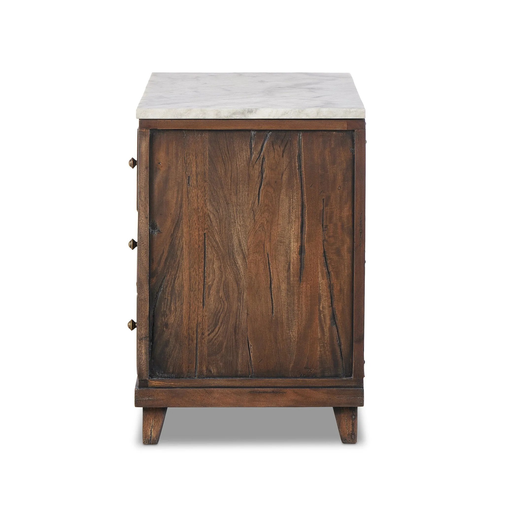 Featuring Odette Antique Belgium Bleach Marble Nightstand by Four Hands at Amethyst Home. Capturing the charm of vintage French storage, this solid mango wood nightstand stands tall with a polished marble top and softened ogee edges. Three spacious drawers are fitted with classic brass-button hardware. Natural marks and cracks are characteristic of the recl. Amethyst Home provides interior design, new home construction design consulting, vintage area rugs, and lighting in the Charlotte metro area.