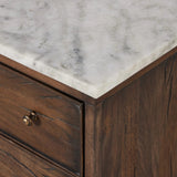 Featuring Odette Antique Belgium Bleach Marble Nightstand by Four Hands at Amethyst Home. Capturing the charm of vintage French storage, this solid mango wood nightstand stands tall with a polished marble top and softened ogee edges. Three spacious drawers are fitted with classic brass-button hardware. Natural marks and cracks are characteristic of the reclaime. Amethyst Home provides interior design, new home construction design consulting, vintage area rugs, and lighting in the Tampa metro area.