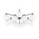 Featuring Orion Black Gunmetal Round Chandelier by Four Hands at Amethyst Home. Matte glass spheres seem to extend and reach across smooth brass rods. Each globe is individually blown, shaped and sculpted by hand through a one-hour process. Matte globes are specially manufactured to evenly diffuse light. The finish on the brass frame is achieved through a spec. Amethyst Home provides interior design, new home construction design consulting, vintage area rugs, and lighting in the Austin metro area.
