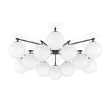 Featuring Orion Black Gunmetal Round Chandelier by Four Hands at Amethyst Home. Matte glass spheres seem to extend and reach across smooth brass rods. Each globe is individually blown, shaped and sculpted by hand through a one-hour process. Matte globes are specially manufactured to evenly diffuse light. The finish on the brass frame is achieved through a spec. Amethyst Home provides interior design, new home construction design consulting, vintage area rugs, and lighting in the Austin metro area.