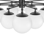 Featuring Orion Black Gunmetal Round Chandelier by Four Hands at Amethyst Home. Matte glass spheres seem to extend and reach across smooth brass rods. Each globe is individually blown, shaped and sculpted by hand through a one-hour process. Matte globes are specially manufactured to evenly diffuse light. The finish on the brass frame is achieved through a spe. Amethyst Home provides interior design, new home construction design consulting, vintage area rugs, and lighting in the Seattle metro area.