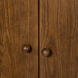 Featuring Renaud Dark Toasted Oak Cabinet by Four Hands at Amethyst Home. A beautifully simple statement piece. This three-door cabinet is crafted from a mix of solid oak and veneer in a dark toasted finish. Details include subtle, tapered corner posts and minimal rounded door knobs.
Overall Dimensions: 20.0" L x 74.0 " W x 69.0" H
Collection: WellsColors:. Amethyst Home provides interior design, new home construction design consulting, vintage area rugs, and lighting in the Alpharetta metro area.