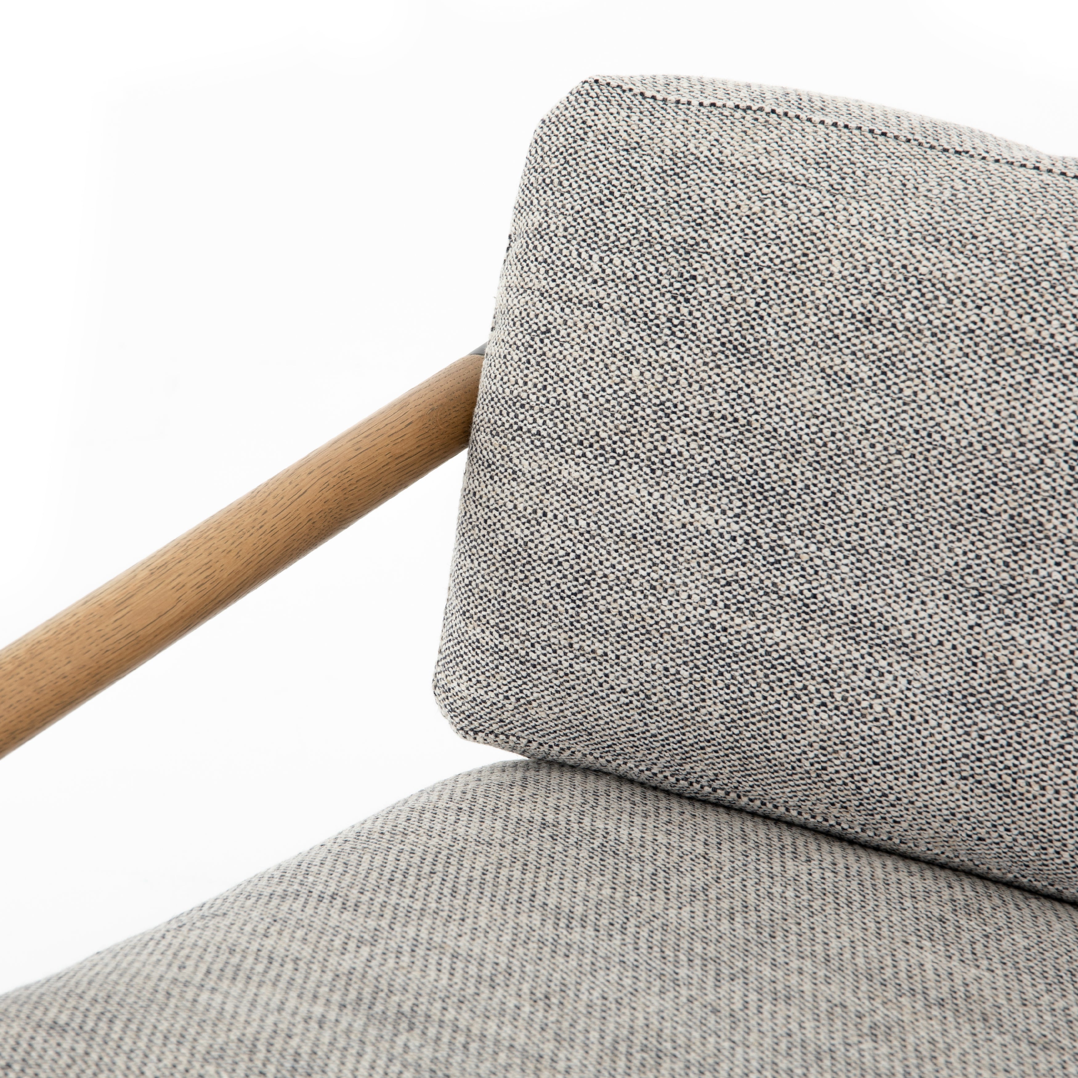 Featuring Rowen Chair - Thames Raven by Four Hands at Amethyst Home. Textural grey seating of performance-grade upholstery, with angular arms of exposed oak providing fresh contrast. Slim, carbon-finished steel legs for a dose of modern-industrial edge. Performance fabrics are specially created to withstand spills, stains, high traffic and wear, ensurin. Amethyst Home provides interior design, new home construction design consulting, vintage area rugs, and lighting in the Newport Beach metro area.