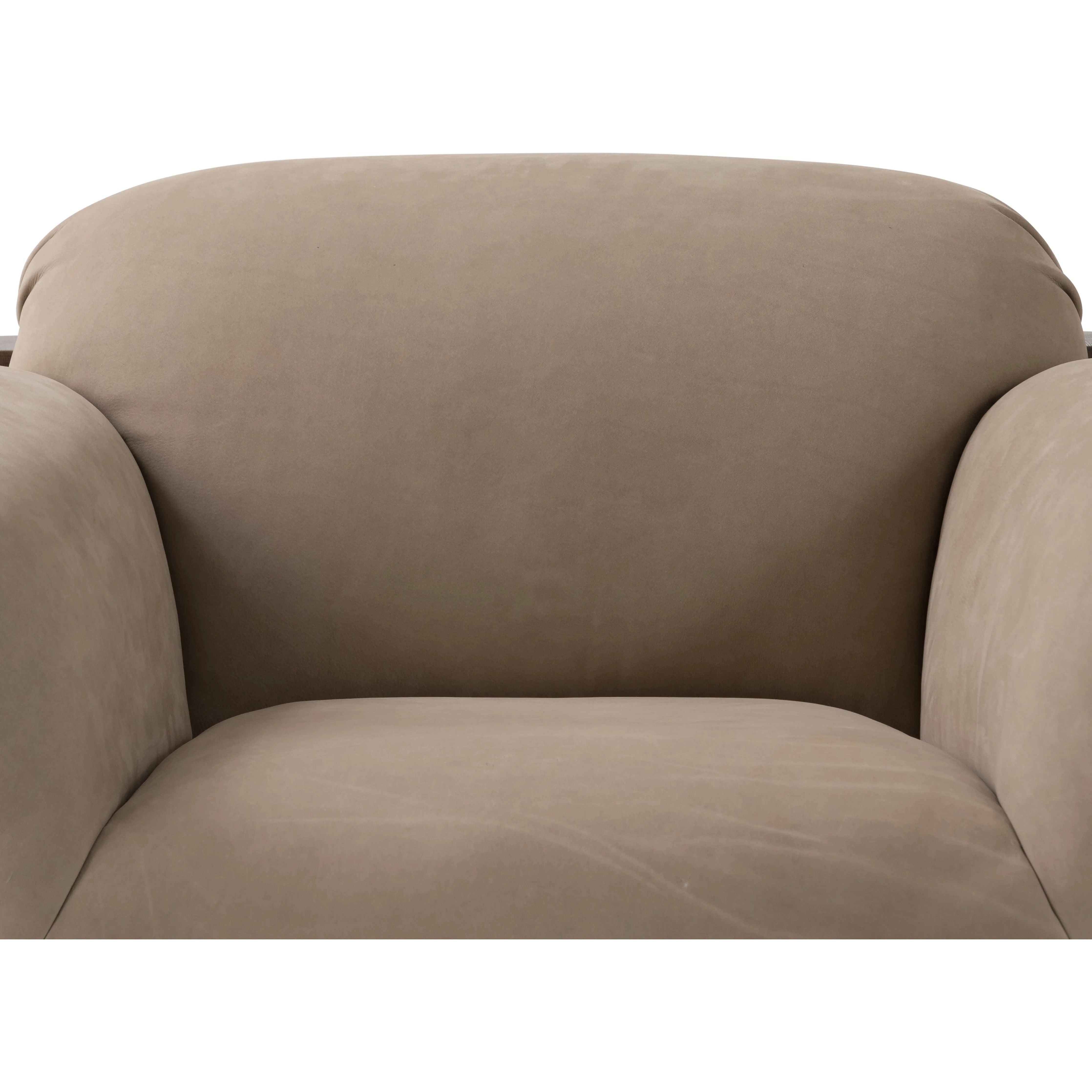 Featuring Samena Nubuck Sand Chair by Four Hands at Amethyst Home. A cozy spot for lounging and curling up with a good book. This statement-making chair features large overflowing cushioning that wraps around the arms and back. Designed with S spring construction and a solid oak frame. Upholstered in a smooth sueded leather with contrasting sling seating st. Amethyst Home provides interior design, new home construction design consulting, vintage area rugs, and lighting in the Park City metro area.