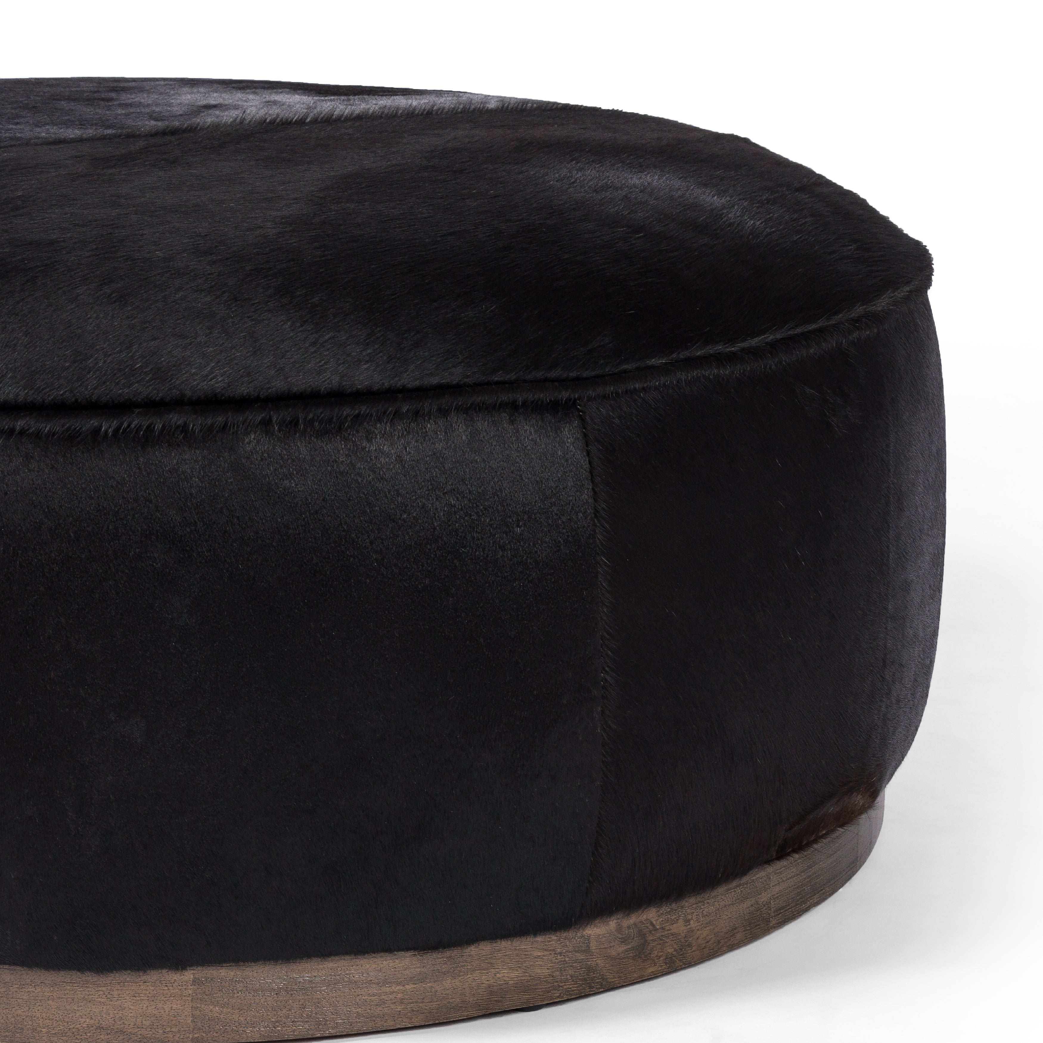 Featuring Sinclair Dark Hair Large Round Ottoman by Four Hands at Amethyst Home. This large, round ottoman of textural hair-on hide brings with it a hip retro vibe as a coffee table or extra seating. Covered in soft and luminous black hair-on hide, which is naturally warm and textural with authentic highlights.
Overall Dimensions: 36"W x 36"L x 14.50"H
Collection: WestgateColors:. Amethyst Home provides interior design, new construction, custom furniture, and area rugs in the Charlotte metro area.