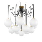 Featuring Spider Burnished Brass Opal Matte Glass Cord Chandelier by Four Hands at Amethyst Home. Matte glass spheres float at varying lengths for a statement-making piece. Each globe is individually blown, shaped and sculpted by hand through a one-hour process. Matte glass is specially manufactured to evenly diffuse light. Brass and glass are 98% recyclable. . Amethyst Home provides interior design, new home construction design consulting, vintage area rugs, and lighting in the Boston metro area.