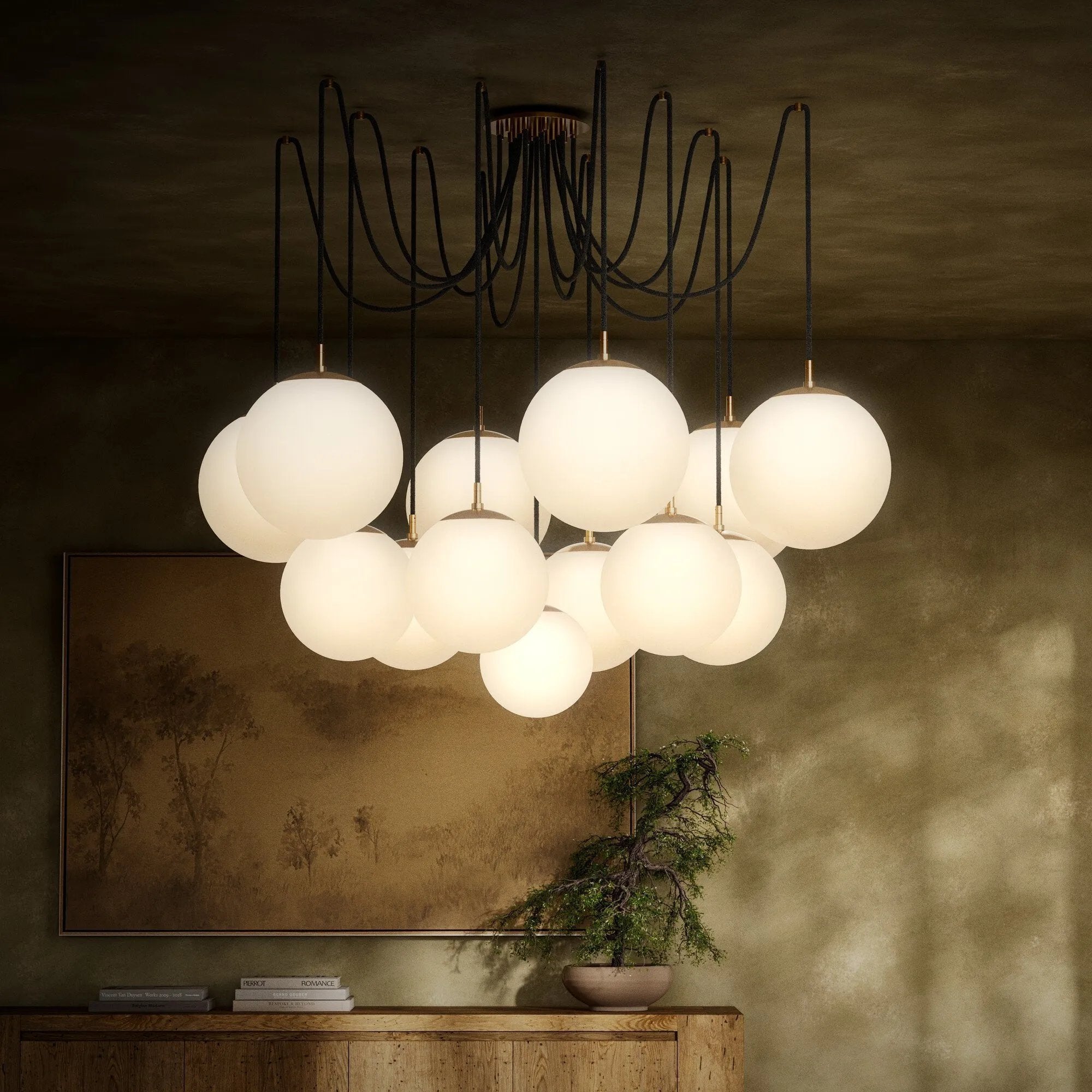 Featuring Spider Burnished Brass Opal Matte Glass Cord Chandelier by Four Hands at Amethyst Home. Matte glass spheres float at varying lengths for a statement-making piece. Each globe is individually blown, shaped and sculpted by hand through a one-hour process. Matte glass is specially manufactured to evenly diffuse light. Brass and glass are 98% recyclable. D. Amethyst Home provides interior design, new home construction design consulting, vintage area rugs, and lighting in the Miami metro area.