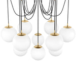 Featuring Spider Burnished Brass Opal Matte Glass Cord Chandelier by Four Hands at Amethyst Home. Matte glass spheres float at varying lengths for a statement-making piece. Each globe is individually blown, shaped and sculpted by hand through a one-hour process. Matte glass is specially manufactured to evenly diffuse light. Brass and glass are 98% recyclable. Amethyst Home provides interior design, new home construction design consulting, vintage area rugs, and lighting in the Monterey metro area.