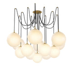Featuring Spider Burnished Brass Opal Matte Glass Cord Chandelier by Four Hands at Amethyst Home. Matte glass spheres float at varying lengths for a statement-making piece. Each globe is individually blown, shaped and sculpted by hand through a one-hour process. Matte glass is specially manufactured to evenly diffuse light. Brass and glass are 98% recyclabl. Amethyst Home provides interior design, new home construction design consulting, vintage area rugs, and lighting in the San Diego metro area.