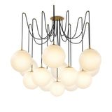 Featuring Spider Burnished Brass Opal Matte Glass Cord Chandelier by Four Hands at Amethyst Home. Matte glass spheres float at varying lengths for a statement-making piece. Each globe is individually blown, shaped and sculpted by hand through a one-hour process. Matte glass is specially manufactured to evenly diffuse light. Brass and glass are 98% recyclabl. Amethyst Home provides interior design, new home construction design consulting, vintage area rugs, and lighting in the San Diego metro area.