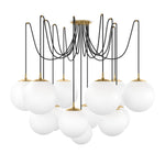 Featuring Spider Burnished Brass Opal Matte Glass Cord Chandelier by Four Hands at Amethyst Home. Matte glass spheres float at varying lengths for a statement-making piece. Each globe is individually blown, shaped and sculpted by hand through a one-hour process. Matte glass is specially manufactured to evenly diffuse light. Brass and glass are 98% recyclable.. Amethyst Home provides interior design, new home construction design consulting, vintage area rugs, and lighting in the Seattle metro area.