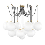 Featuring Spider Burnished Brass Opal Matte Glass Cord Chandelier by Four Hands at Amethyst Home. Matte glass spheres float at varying lengths for a statement-making piece. Each globe is individually blown, shaped and sculpted by hand through a one-hour process. Matte glass is specially manufactured to evenly diffuse light. Brass and glass are 98% recyclable.. Amethyst Home provides interior design, new home construction design consulting, vintage area rugs, and lighting in the Seattle metro area.