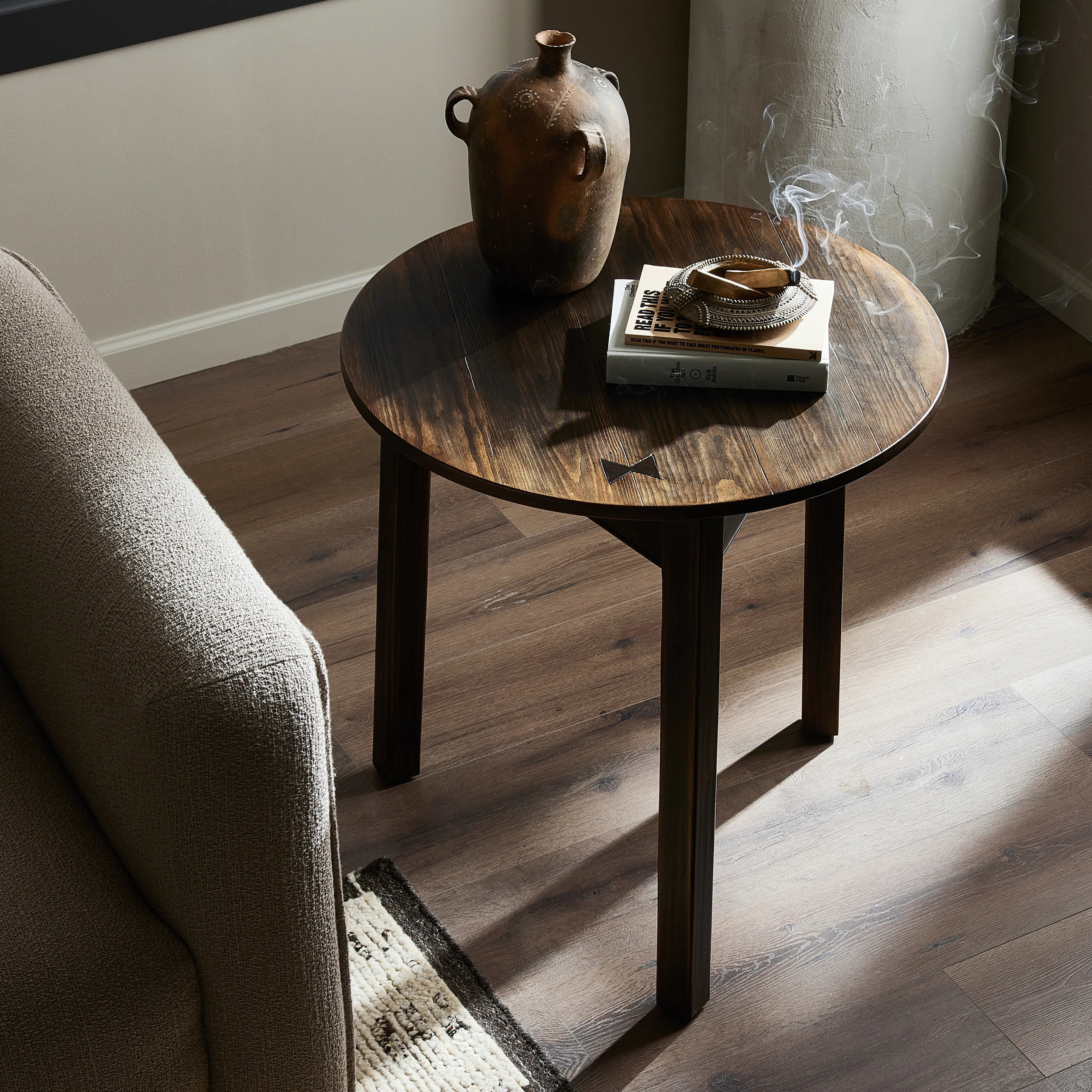 Featuring The Aged Brown Pimms Table by Four Hands at Amethyst Home. Brown-finished pine forms a versatile three-legged end table with a playful feel. By the makers at Van Thiel, known for their antique-inspired pieces and hand-applied finishes.Overall Dimensions: 24.75"W x 24.75"L x 26"H
Collection: Van ThielColors: Aged Bronze ,Aged Brown Veneer ,Age. Amethyst Home provides interior design, new home construction design consulting, vintage area rugs, and lighting in the Salt Lake City metro area.