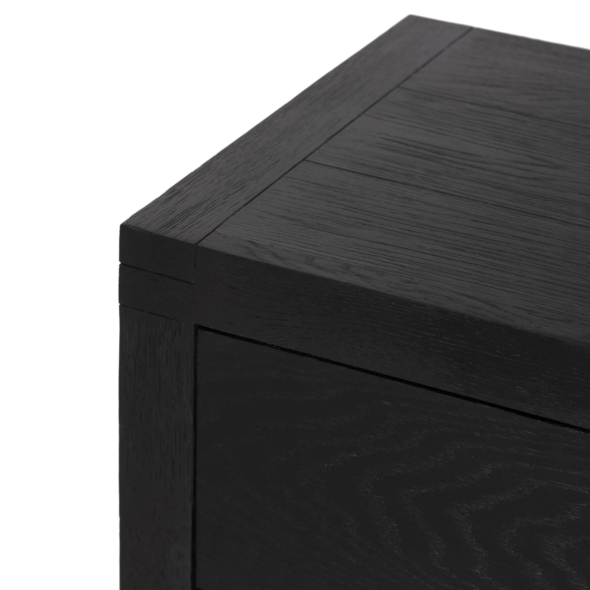Featuring Warby Worn Black Oak Nightstand by Four Hands at Amethyst Home. Solid acacia shapes a streamlined box-style nightstand, with lap joint corners for a detail-driven touch. Finished with smooth, push-latch drawer glides.Collection: BennettColors: Worn Black Oak ,Worn Black VeneerMaterials: Solid Oak ,Thick Oak Veneer Weight: 94.8 lbs. Amethyst Home provides interior design, new home construction design consulting, vintage area rugs, and lighting in the Laguna Beach metro area.