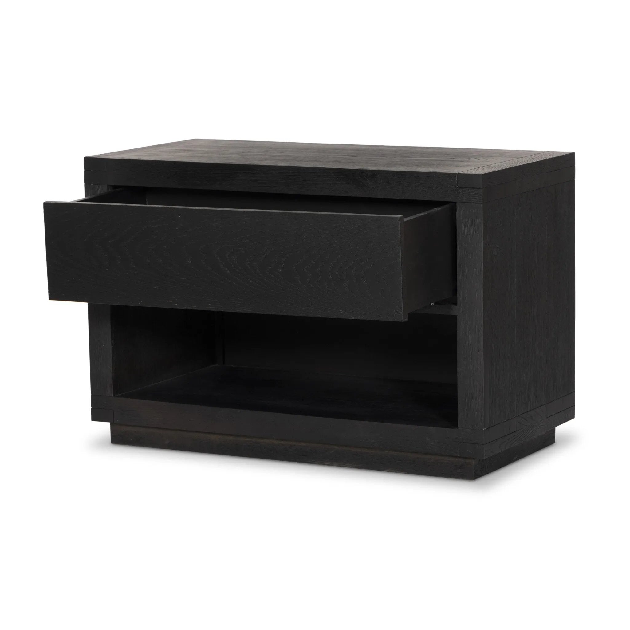 Featuring Warby Worn Black Oak Nightstand by Four Hands at Amethyst Home. Solid acacia shapes a streamlined box-style nightstand, with lap joint corners for a detail-driven touch. Finished with smooth, push-latch drawer glides.Collection: BennettColors: Worn Black Oak ,Worn Black VeneerMaterials: Solid Oak ,Thick Oak Veneer Weight: 94.8 lbs. Amethyst Home provides interior design, new home construction design consulting, vintage area rugs, and lighting in the Washington metro area.