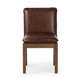 Featuring Wilmington Tan Oak Dining Chair by Four Hands at Amethyst Home. Inspired by the folded pillow form, the seat and back cushions of this oak dining chair are covered in brown top-grain leather. The chair back features leather strap details for a mixed material touch.Collection: AshfordColors: Tan Oak ,Havana BrownMaterials: Solid Oak ,Top Grain Lea. Amethyst Home provides interior design, new home construction design consulting, vintage area rugs, and lighting in the Alpharetta metro area.