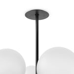 Featuring Zodiac Black Gunmetal Chandelier by Four Hands at Amethyst Home. Matte glass spheres seem to extend and reach across smooth brass rods. Each globe is individually blown, shaped and sculpted by hand through a one-hour process. Matte glass is specially manufactured to evenly diffuse light. The finish on the brass frame is achieved through a speciali. Amethyst Home provides interior design, new home construction design consulting, vintage area rugs, and lighting in the Charlotte metro area.