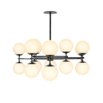 Featuring Zodiac Black Gunmetal Chandelier by Four Hands at Amethyst Home. Matte glass spheres seem to extend and reach across smooth brass rods. Each globe is individually blown, shaped and sculpted by hand through a one-hour process. Matte glass is specially manufactured to evenly diffuse light. The finish on the brass frame is achieved through a speci. Amethyst Home provides interior design, new home construction design consulting, vintage area rugs, and lighting in the Laguna Beach metro area.