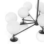 Featuring Zodiac Black Gunmetal Chandelier by Four Hands at Amethyst Home. Matte glass spheres seem to extend and reach across smooth brass rods. Each globe is individually blown, shaped and sculpted by hand through a one-hour process. Matte glass is specially manufactured to evenly diffuse light. The finish on the brass frame is achieved through a special. Amethyst Home provides interior design, new home construction design consulting, vintage area rugs, and lighting in the Scottsdale metro area.