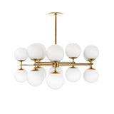 Featuring Zodiac Burnished Brass Chandelier by Four Hands at Amethyst Home. Matte glass spheres seem to extend and reach across smooth brass rods. Each globe is individually blown, shaped and sculpted by hand through a one-hour process. Matte glass is specially manufactured to evenly diffuse light. Brass and glass are 98% recyclable. Designed and sustainabl. Amethyst Home provides interior design, new home construction design consulting, vintage area rugs, and lighting in the Calabasas metro area.