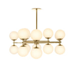 Featuring Zodiac Burnished Brass Chandelier by Four Hands at Amethyst Home. Matte glass spheres seem to extend and reach across smooth brass rods. Each globe is individually blown, shaped and sculpted by hand through a one-hour process. Matte glass is specially manufactured to evenly diffuse light. Brass and glass are 98% recyclable. Designed and sustainably cr. Amethyst Home provides interior design, new home construction design consulting, vintage area rugs, and lighting in the Tampa metro area.