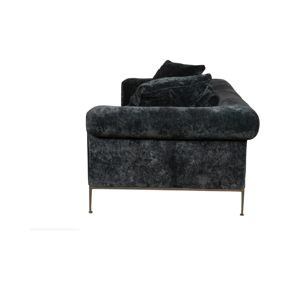 Featuring Henrietta Upholstered Sofa by Cisco Brothers at Amethyst Home. This dapper sofa has a distinctive style, with elegant roll arms and metal black-rust legs. Update your space with this mid-century influenced piece. This is an Amethyst favorite -- we love that the velvet can read black or navy depending on the natural light and time of day.
Henriett. Amethyst Home provides interior design, new home construction design consulting, vintage area rugs, and lighting in the Charlotte metro area.
