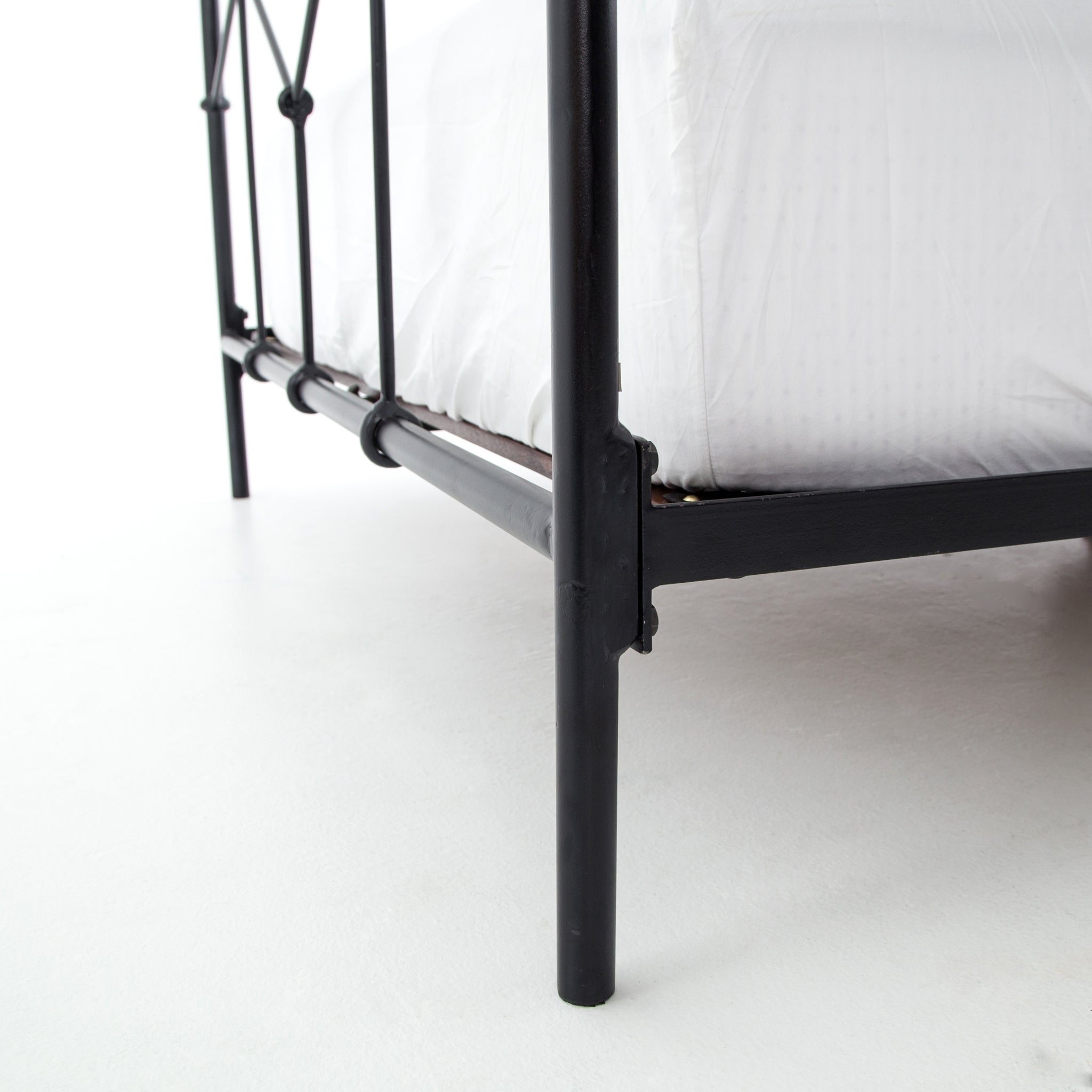 Featuring Winston Bed by Four Hands at Amethyst Home. Vintage style for a classic bedroom look.  Durable, heavy iron makes for a supportive, wiggle-free bed.
King Size Overall Dimensions: 77.50"W x 83.50"L x 51"HQueen Size Overall Dimensions: 61.50"W x 84"L x 51.50"HTwin Size Overall Dimensions: 40.50"W x 78.50"L x 51"H
Colors: Sandblasted Vintage BlackMa.  Amethyst Home provides interior design, new home construction design consulting, vintage area rugs, and lighting in the Des Moines metro area.