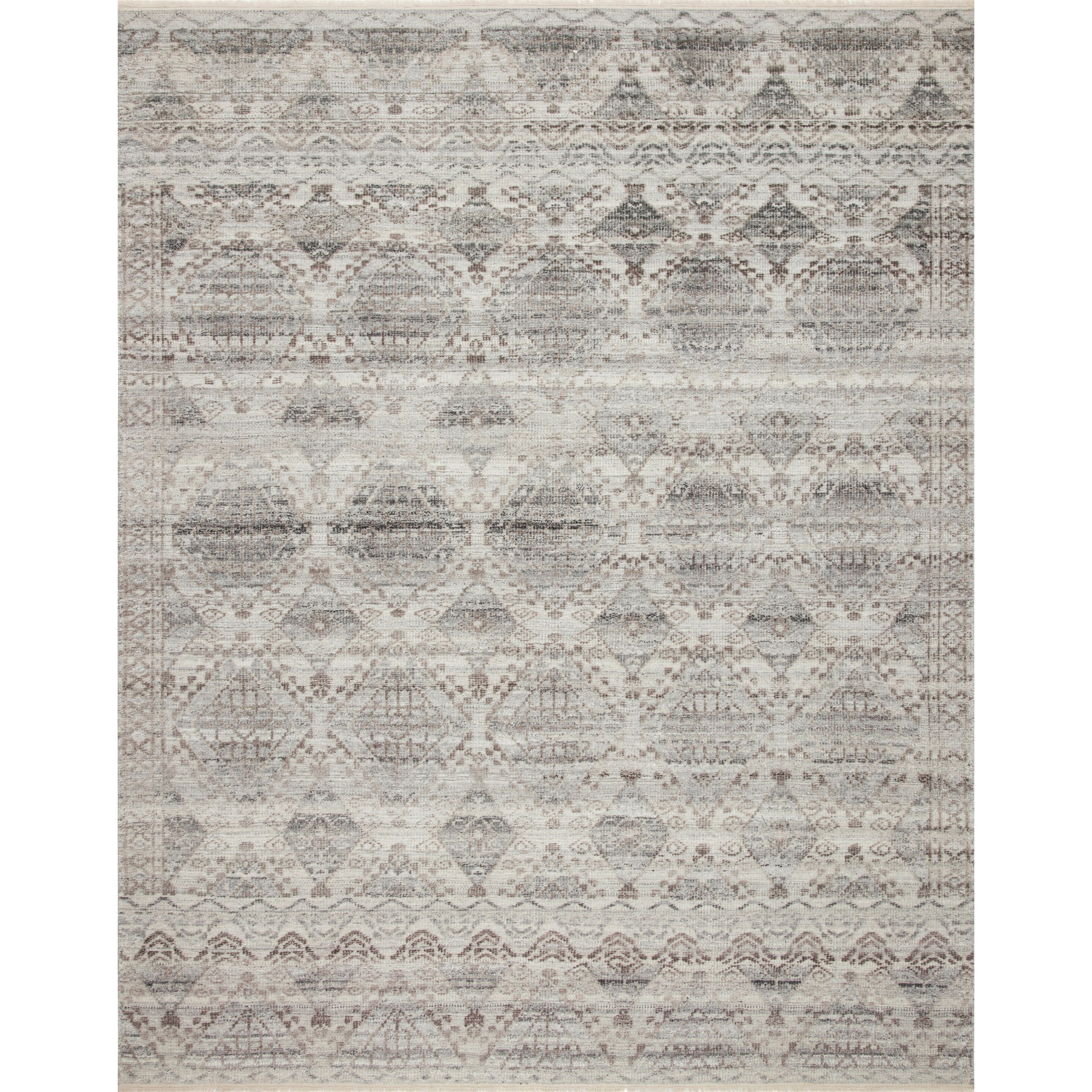 Featuring Idris Stone Hand-Knotted Rug by Loloi at Amethyst Home. The Idris Stone area rug from Loloi is meticulously hand-knotted of viscose and wool. You will love this rug because the rug is:
Perfect for entryways, living rooms, and bedrooms
Easy to clean and maintain
Gorgeous with the intricate pattern and patina
Warms up any room with the high / low pi.  Amethyst Home provides interior design, new home construction design consulting, vintage area rugs, and lighting in the Seattle metro area.