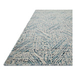 Featuring Raven Blue / Ivory Rug by Loloi at Amethyst Home. The Raven Blue / Ivory Rug is intricately handwoven with delicate, fine yarns that amplify the rug's layered and dimensional geometric design. While the rug itself is thick and sturdy, the colors and patterns have a casual lightness that can work in many spaces, from busy living rooms to serene bedrooms. The Raven Bl. Amethyst Home provides interior design, new construction, custom furniture, and area rugs in the Newport Beach metro area.