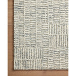 Featuring Tallulah Sky / Ivory Rug by Loloi at Amethyst Home. Hand-crafted with a combination of thick and fine yarns, the Tallulah Sky / Ivory Rug area rug creates dynamic dimension in living rooms, bedrooms, and more. The thicker yarns define the abstract, linear design, giving the rug a distinct high-low texture and sense of movement. Tallulah's soft, neutral palettes have a depth. Amethyst Home provides interior design, new construction, custom furniture, and area rugs in the Omaha metro area.