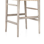 Featuring Muestra Counter + Bar Stool - Weathered Grey by Four Hands at Amethyst Home. Modern curves redefine the classic wishbone-style counter stool. Vintage white all-weather wicker is woven for a dose of fresh texture within weathered grey teak framing. Cover or store indoors during inclement weather and when not in use.
Counter Stool Overall Size: 21.5.  Amethyst Home provides interior design, new home construction design consulting, vintage area rugs, and lighting in the Monterey metro area.