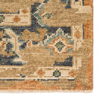 Featuring Rhapsody Cadenza Honey Ginger Hand-Knotted Rug by Jaipur Living at Amethyst Home. The Rhapsody Cadenza Honey Ginger Area Rug features heirloom-quality designs of stunningly abrashed Old World patterns. The Cadenza area rug showcases a distressed center medallion in orange, blue, and light green on a neutral beige ground. This durable wool handkno.  Amethyst Home provides interior design, new home construction design consulting, vintage area rugs, and lighting in the Charlotte metro area.