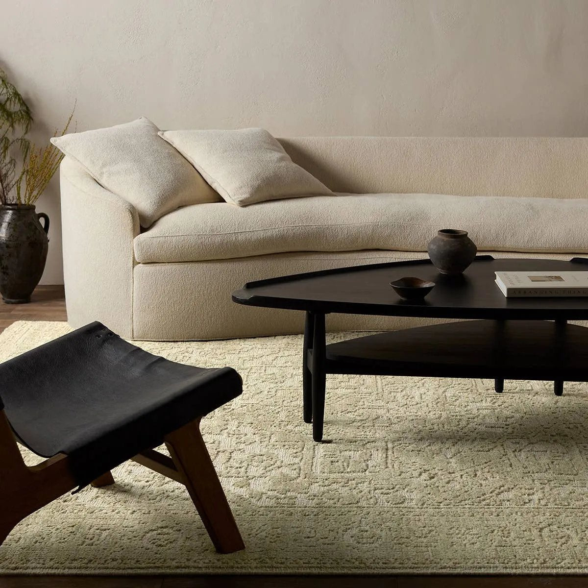 Featuring Aposio Pranhita Hand-Knotted Rug by Jaipur Living at Amethyst Home. An extraordinary modern-day classic, the Pranhita rug’s sculptural hand-cut pile is plush, easy-to-care-for and stain resistant, but it is the impressive hand-knotted construction that sets it apart. Handmade in whisper-soft sage and ethereal gray, the Pranhita design’s subtle cut pil. Amethyst Home provides interior design, new home construction design consulting, vintage area rugs, and lighting in the Omaha metro area.