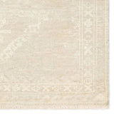 Featuring Ashend Vavite Hand-Knotted Rug by Jaipur Living at Amethyst Home. Hand carded wool, soft Tencel, and a neutral color palette define the handknotted Ashend Vavite. The Vavite rug showcases a Moroccan-inspired center medallion in a neutral cream and tan colorway. Geometric detailing establishes a thin border and provides a nod to the tribal styles. Amethyst Home provides interior design, new home construction design consulting, vintage area rugs, and lighting in the Los Angeles metro area.