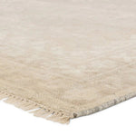 Featuring Ashend Vavite Hand-Knotted Rug by Jaipur Living at Amethyst Home. Hand carded wool, soft Tencel, and a neutral color palette define the handknotted Ashend Vavite. The Vavite rug showcases a Moroccan-inspired center medallion in a neutral cream and tan colorway. Geometric detailing establishes a thin border and provides a nod to the tribal styles o. Amethyst Home provides interior design, new home construction design consulting, vintage area rugs, and lighting in the San Diego metro area.