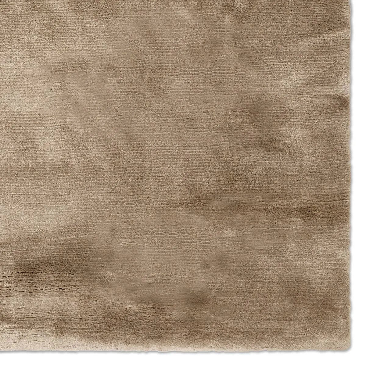 Featuring Chronos Resonance Rug by Jaipur Living at Amethyst Home. The Chronos Resonance invites you to experience the unrivaled softness and exquisite allure of 100% Cashmere wool. Handwoven and thoughtfully crafted, the beige Resonance design brings the heirloom-quality rare fiber to life. This exceptionally warm and inviting piece is meant to be kept in. Amethyst Home provides interior design, new home construction design consulting, vintage area rugs, and lighting in the Alpharetta metro area.