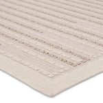 Featuring Continuum Theorem Rug by Jaipur Living at Amethyst Home. The Continuum collection brings the classic sisal look to outdoor spaces and high-traffic indoor areas. The soft Axiom design features an abstract, geometric pattern with cream high-low pile for added dimension. The polypropylene fibers are stain and water resistant for an easy-care accent . Amethyst Home provides interior design, new home construction design consulting, vintage area rugs, and lighting in the Des Moines metro area.