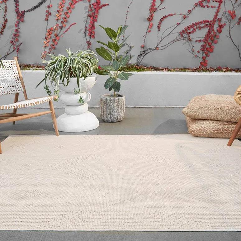 Featuring Continuum Cardinal Rug by Jaipur Living at Amethyst Home. The Continuum collection brings the classic sisal look to outdoor spaces and high-traffic indoor areas. The soft Axiom design features an abstract, geometric pattern with cream high-low pile for added dimension. The polypropylene fibers are stain and water resistant for an easy-care accent piec. Amethyst Home provides interior design, new home construction design consulting, vintage area rugs, and lighting in the Tampa metro area.