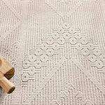 Featuring Continuum Cardinal Rug by Jaipur Living at Amethyst Home. The Continuum collection brings the classic sisal look to outdoor spaces and high-traffic indoor areas. The soft Axiom design features an abstract, geometric pattern with cream high-low pile for added dimension. The polypropylene fibers are stain and water resistant for an easy-care accent. Amethyst Home provides interior design, new home construction design consulting, vintage area rugs, and lighting in the Washington metro area.