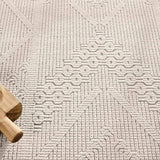 Featuring Continuum Cardinal Rug by Jaipur Living at Amethyst Home. The Continuum collection brings the classic sisal look to outdoor spaces and high-traffic indoor areas. The soft Axiom design features an abstract, geometric pattern with cream high-low pile for added dimension. The polypropylene fibers are stain and water resistant for an easy-care accent. Amethyst Home provides interior design, new home construction design consulting, vintage area rugs, and lighting in the Washington metro area.