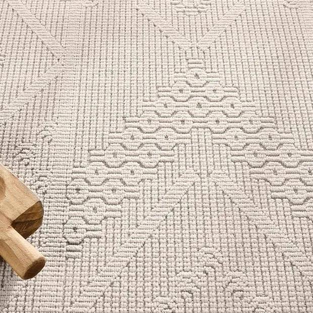 Featuring Continuum Cardinal Rug by Jaipur Living at Amethyst Home. The Continuum collection brings the classic sisal look to outdoor spaces and high-traffic indoor areas. The soft Axiom design features an abstract, geometric pattern with cream high-low pile for added dimension. The polypropylene fibers are stain and water resistant for an easy-care accent. Amethyst Home provides interior design, new home construction design consulting, vintage area rugs, and lighting in the Washington metro area.