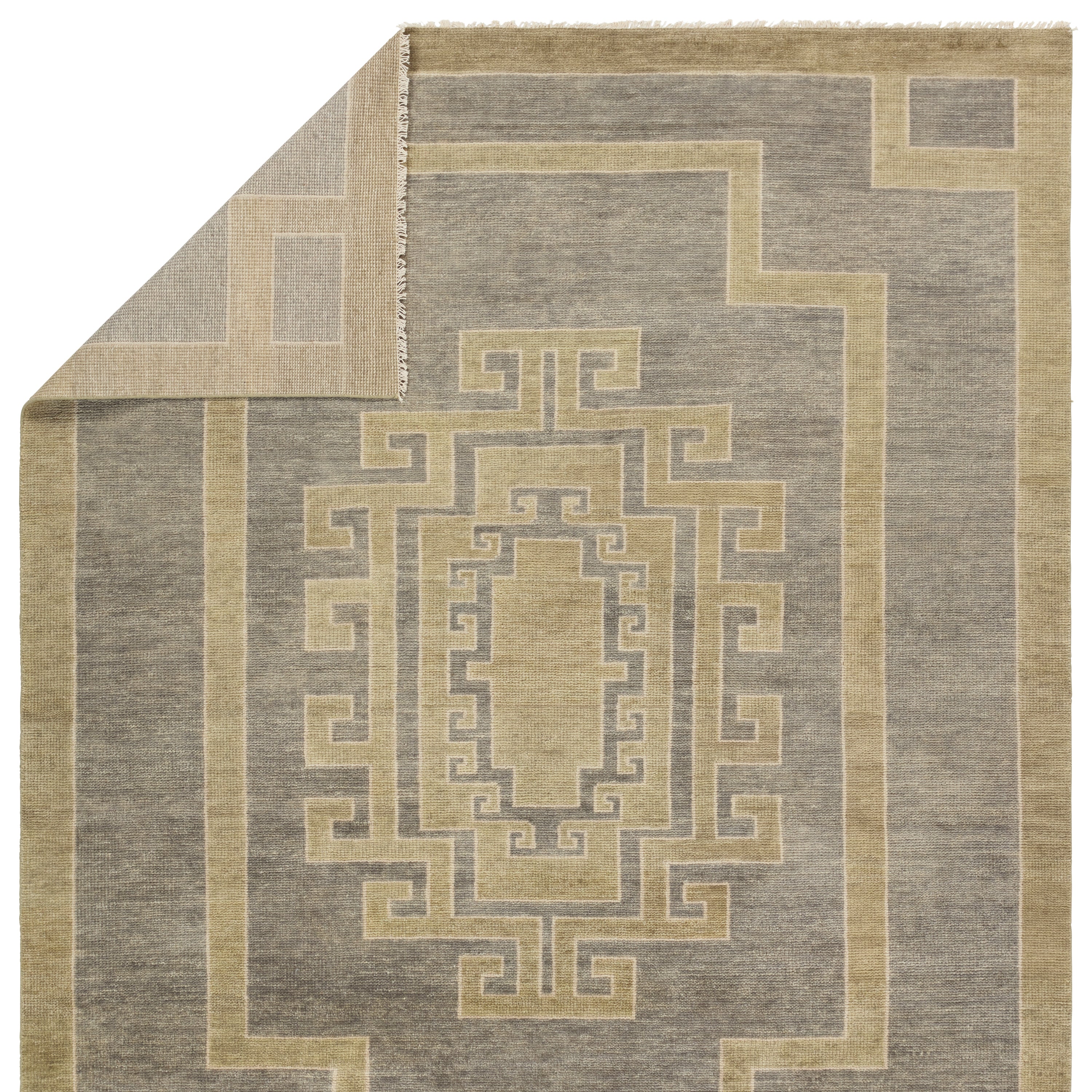 Featuring Cyprus Gray Kyrenia Hand-Knotted Rug by Jaipur Living at Amethyst Home. The hand-knotted Cyprus collection showcases a modern representation of vintage Kars designs with clean-lined geometric details and fresh colorways. The gray, sage, and cream Kyrenia design delights with an antique medallion pattern and a similarly styled border. Low pile and naturally stain resista. Amethyst Home provides interior design, new construction, custom furniture, and area rugs in the Calabasas metro area.