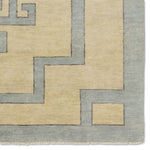Featuring Cyprus Nicosia Asparagus Hand-Knotted Rug by Jaipur Living at Amethyst Home. The hand-knotted Cyprus collection showcases a modern representation of vintage Kars designs with clean-lined geometric details and fresh colorways. The blue, cream, gray, and caramel colored Nicosia design delights with a minimalistic medallion pattern and multiple borders. Low pile and natu. Amethyst Home provides interior design, new construction, custom furniture, and area rugs in the Kansas City metro area.