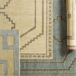 Featuring Cyprus Nicosia Asparagus Hand-Knotted Rug by Jaipur Living at Amethyst Home. The hand-knotted Cyprus collection showcases a modern representation of vintage Kars designs with clean-lined geometric details and fresh colorways. The blue, cream, gray, and caramel colored Nicosia design delights with a minimalistic medallion pattern and multiple borders. Low pile and n. Amethyst Home provides interior design, new construction, custom furniture, and area rugs in the Salt Lake City metro area.