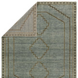 Featuring Cyprus Paphos Hand-Knotted Rug by Jaipur Living at Amethyst Home. The hand-knotted Cyprus collection showcases a modern representation of vintage Kars designs with clean-lined geometric details and fresh colorways. The blue, gray and sage green Paphos design delights with a minimalistic medallion pattern and a similarly styled border. Low pile and naturally stain resist. Amethyst Home provides interior design, new construction, custom furniture, and area rugs in the Calabasas metro area.